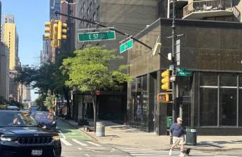 The intersection where police say a 25-yearold driver delivering goods in an Amazon e-van mowed down a 79-year-old pedestrian fter exchanging words.
