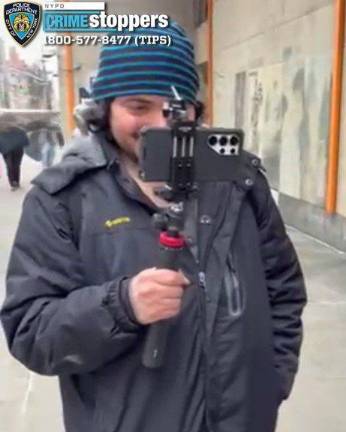 Social media troll wanted for hate crime arson; later arrested as Michael Santiago.