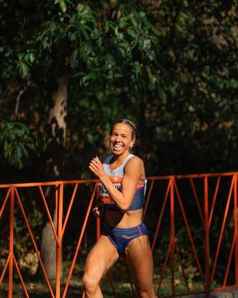 Smiling Felician Pasadyn in Central Park; such composure is as impressive as her time.
