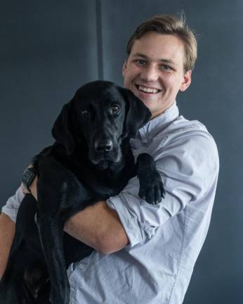 Nikolas Powers with Daisy. Photo courtesy of Lise Evans, and Kris and Nikolas Powers