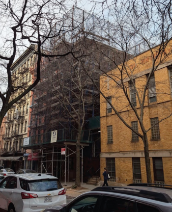 The Landmarks Preservation Commission has shot down demolition plans for 139 Thompson St., a landmarked rent-stabilized apartment building (above, scaffolding), pleasing local advocates.
