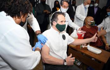 On Wednesday, March 17, 2021 Governor Andrew M. Cuomo received the Johnson and Johnson coronavirus vaccine from Dr. Jacqueline Delmont at a pop up vaccination site in Harlem. Photo: Kevin P. Coughlin / Office of Governor Andrew M. Cuomo