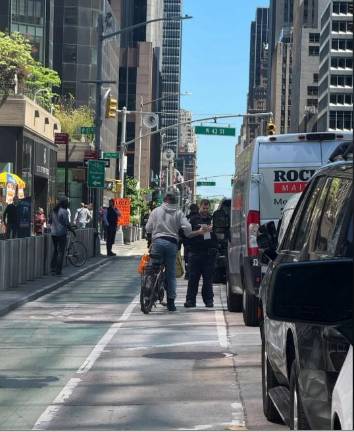 NYPD continues its blitz of writing criminal summonses for bikers who violate traffic laws. A poster on r/NYCbike spotted this action near W. 43rd St. on May 20.