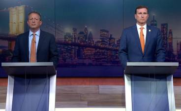 Brad Lander and Dan Goldman during a June 1 Democratic primary debate