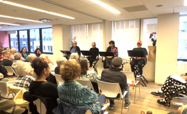Gary Tomei (from left), Ronnie Sholom, Adrienne Viscio and Michael Pollack speak at CaringKind headquarters on April 19, during a “To Whom I May Concern” storytelling event.