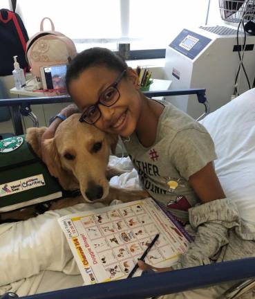 Patient Kayla with Professor. (Photo: Mount Sinai Kravis Children’s Hospital)