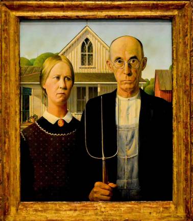 Grant Wood's iconic painting, &quot;American Gothic,&quot; is on loan from the Art Institute of Chicago and on view at the Whitney through June 10. Photo: Adel Gorgy
