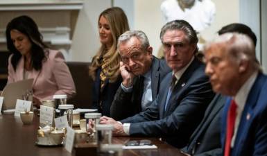 Health and Human Services Secretary Robert F. Kennedy, Jr. (center) joins President Donald Trump at a Cabinet meeting in the White House, April 10.