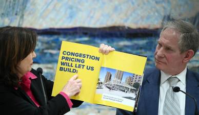 Gov. Kathy Hochul and MTA Chair Janno Lieber, point to long-term benefits of congestion pricing at the MTA board meeting. Hochul said she would fight President Trump’s efforts to end the controversial toll.
