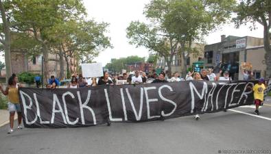 Protestors marching on Staten Island in July 2016, two years after the death of Eric Garner.