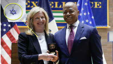New York City Mayor Eric Adams swears in Jessica Tisch as the next commissioner of the New York City Police Department on Nov. 25, 2024. Tisch, a billionaire heiress, is a well-known philanthropist for Jewish causes who often wears a Star of David at public appearances.