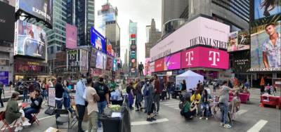 Outreach effort in Times Square. Photo: Center for Court Innovation