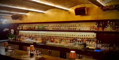 Teruko bar with a shell backbar salvaged from Tokyo’s iconic Orchid Bar showcases its extensive whiskey offerings. said by the owners to be the largest collection of Japanese whiskys in North America.