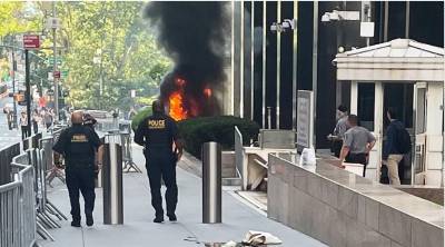 A photo provided by Robert Sullivan shows black smoke and flames in front of 26 Federal Plaza in lower Manhattan on the morning of July 20, 2026.