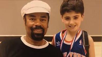 Cooper Stock (right) with Knicks legend Walt “Clyde” Frazier at Frazier’s Summer Basketball Camp.