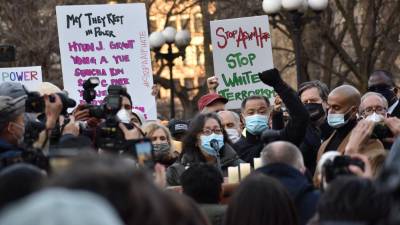 Asian American Federation Executive Director Jo-Ann Yoo speaks to the crowd that surrounds her in Union Square on March 19 about the ongoing violence against Asian Ameicans. Photo: Leah Foreman