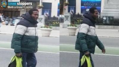 Suspected Flatiron stabber walking past Madison Square Park, Worth Square behind him, March 29.