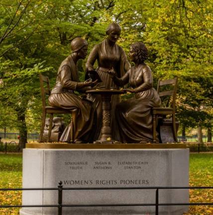 The<i> Women’s Rights Pioneers Monument</i>, sculpted by Meredith Bergmann, is located mid-park at 68th Street.