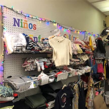 The Little Shop of Kindness used soft lighting and arranged clothes by sizes, before the Sept. 29th flood forced it to permanently shut down the store. Photo: Keith J. Kelly