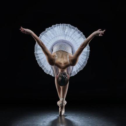 Elizabeth Yilmaz-Dobrow takes a bow in a posed ballet shot. Photo: Richard Calmes