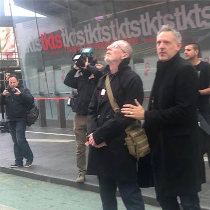 Thomas Hand, the father of Emily who spent her nine year old birthday in captivity was in New York on Nov. 17th to bring attention to the 240 victims who were kidnapped by Hamas. He is comforted by Robert Anders, one of the co-founders of the Bring Them Home Now campaign as he gazed up at billboard in Times Square with daughter’s picture. She was among the hostages who were freed.
