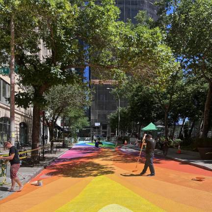 A 6,000 sq. ft. mural called “Urban Flow” is being painted next to Spring Street Park in Hudson Square, with volunteer help, courtesy of the Hudson Square Business Improvement District (HSBID).