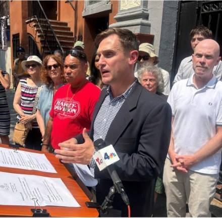 Council Member Carl Wilson at a rally to save Our Lady of Guadalupe Church on West 14th Street.