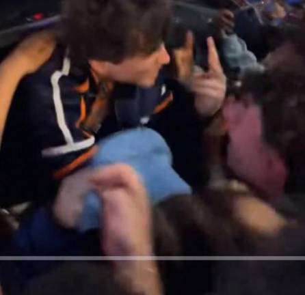 Timothée Chalamet, who played Bob Dylan in the bio-opic, is mobbed by fans as he leaves Madison Square Garden on May 16 after the Knicks advanced to the Eastern Conference finals by defeating defending NBA champion Boston Celtics in a 119-81 blowout.