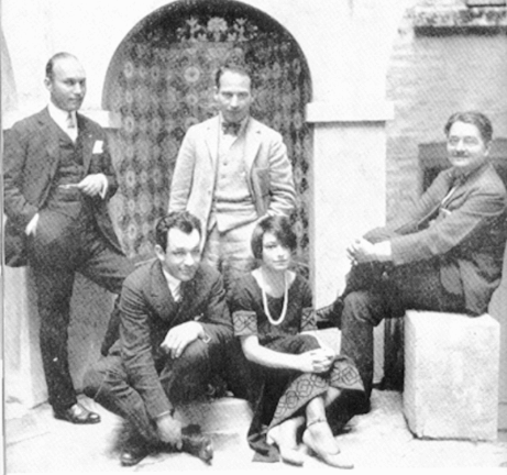Dorothy Parker (center) was the only woman who was a member of the Algonquin Roundtable with also included (clockwise from upper left Art Samuels, Charlie MacArthur, Harpo Marx, and Alexander Woollcott. She’s the focus of a new play by Douglas Carter Beane.
