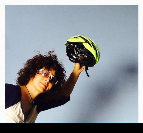 Angela Azzolino tips her helmet. Photo: GWC