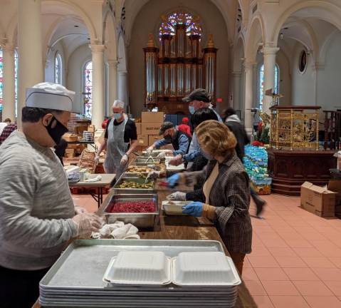 The Holy Apostles Soup Kitchen volunteers prepare meals for those in need. Photo courtesy of Holy Apostles Soup Kitchen.