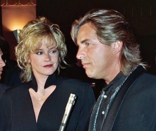 Melanie Griffin with Don Johnson in 1990, not too long after Working Girl was released in 1988. Screenwriter Kevin Wade said he was inspired to write it after visiting NYC in the mid-1980s and witnessing hard charging woman racing to work in sneakers carrying the high heels they’d strap on as soon as they hit the office. Today, with a lot fewer people and a more casual vibe, it’s doubtful a writer would find the same inspiration. Photo: Alan Light, Wikimedia Commons