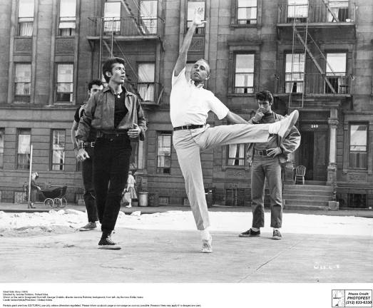 Jerome Robbins, center, on the set of the 1961 film version of "West Side Story. Robbins, who directed is pictured with, from left, Jay Norman, George Chakiris, Jay Norman and Eddie Verso. Photo: Photofest