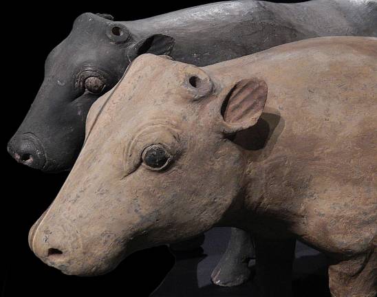 The astonishing realism of this pair of bovines belies their supernatural function. A barnyard full of ceramic livestock provided feasts for the next life. Photo: Adel Gorgy