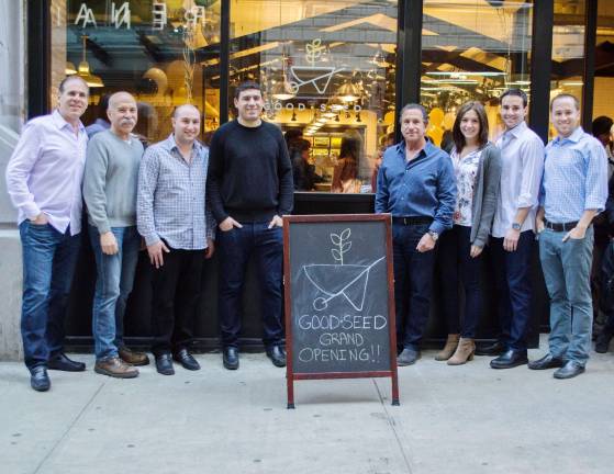 Brothers Lee Novick and Daniel Novick recently opened Good Seed, on 35th Street, with two other families, after working with their father, Howard Novick. Pictured left to right: Richard Greenstein, Howard Novick, Eric Portnoy, Daniel Greenstein, Ronnie Portnoy, Dayna Greenstein, Lee Novick and Daniel Novick.