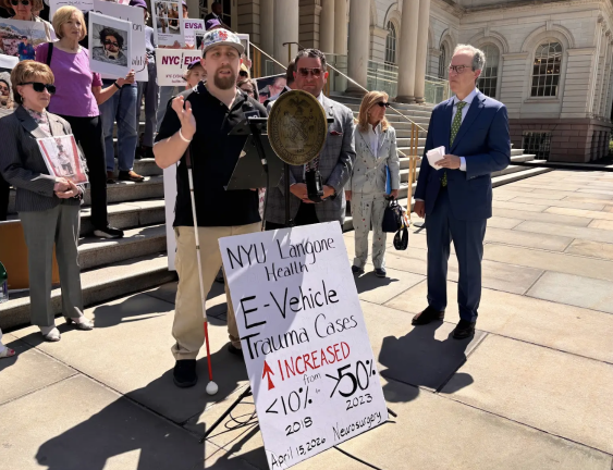 Walter Matuza, who is legally blind and a plaintiff in the lawsuit, says fast-moving e-bikes have made his daily commute to Manhattan increasingly dangerous.
