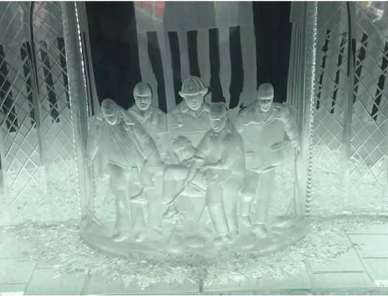 A Waterford crystal etching of the famous photo of the grief stricken emergency workers who carried the FDNY chaplain, Father Mychal Judge from the north tower. He was declared victim #1 on that awful day 22 years ago. Photo: Courtesy of the Port Authority of New York and New Jersey