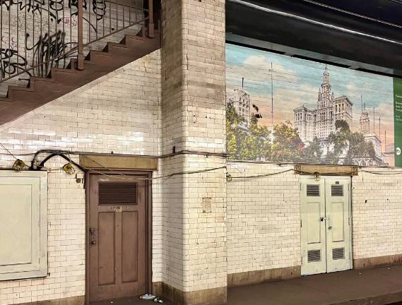On the easternmost wall of the Chambers Street Station, an MTA mural depicts the David N Dinkins Municipal Building, which is atop the southern end of the station. This platform has been unused for a long time, rust and graffiti are evident. A $100 million rehabilitation for both this station and the 190th Street A Line station is forthcoming for them, but no contractors have been named. When that is settled, it will be two years to finish all the work in both places.