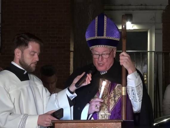 Cardinal Timoth Dolan celebrated the dedication Mass for the new bells and clock tower of Most Holy Redeeemer on Dec. 23. Photo: New York Archdiocese