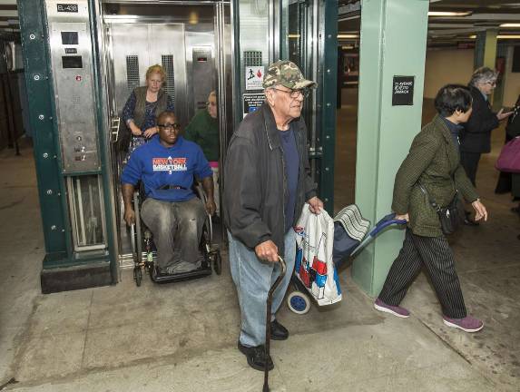 With less than 25 percent of subway stations accessible, New York City wheelchair users often face long, complicated commutes, and few alternative options. Class actions filed in state and federal courts against the MTA hope to change that. Patrick Cashin/MTA