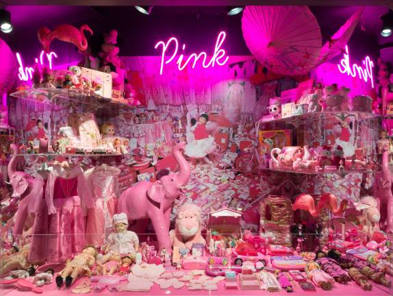 An ode to girlhood, the diorama in the first gallery features pink toys, doll clothes, princess costumes, flamingos, a calculator, Minnie Mouse and more. Objects lent by Raina Bajpai, Jessica Barber and Jennifer Morgan, Grazia d'Annunzio, The Fashion Class, Jennifer Farley Gordon, Theodora Hellen Rose Ingersoll, Loretta Keane, Larissa King, Olympia Maldonado, Melissa Marra, Gladys Rathod, Jody Shields, Julie Steele and Hannah Steele-Morris. Photo: © The Museum at FIT
