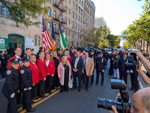 After the mass, group photos. Red jackets are members of NYPD Pulaski Society.