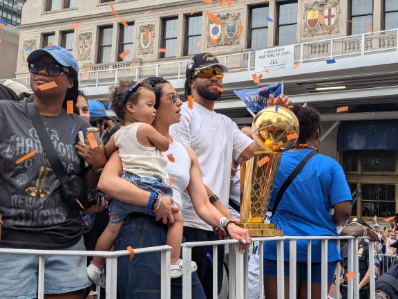 Knicks ticker tape parade Jalen Brunson, his wife Ali Marks and their daughter Jordyn.