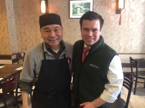 Chen Lieh Tang and his son, James, in their new restaurant, Shorty Tang Noodles, on Eight Avenue and 15th Street. Photo: Lily Haight