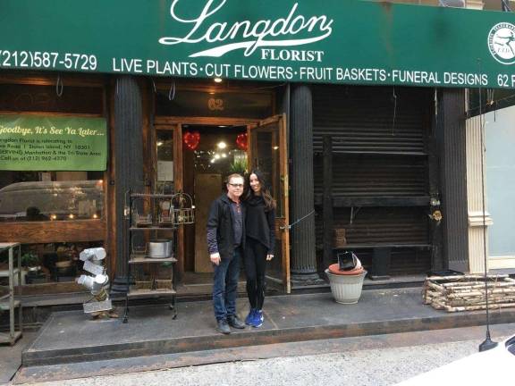 Joe Rizzo, the owner of Langdon Florist in Tribeca, and Stephanie Gregg, his oldest daughter, stand under the awning of his storied shop at 62 Reade Street. After running the business for the past 35 years, and tending to customers from first lady Chirlane McCray to former first lady Laura Bush, Rizzo closed the store on March 10 and is relocating to Staten Island. Photo: Courtesy of Langdon Florist
