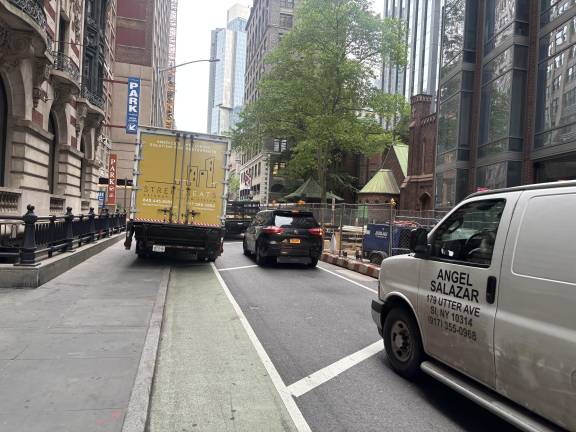 Bike advocates complain that there is little enforcement of motor vehicles that park in bike lanes such as this unticketed truck parked on E. 29th St. on May 13.