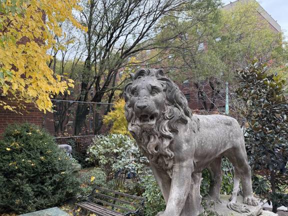 A lion statue at one end of the park.