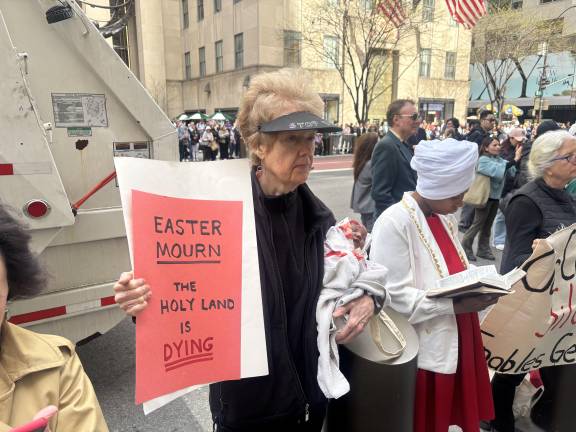 Mary Yelenick was among protesters at the otherwise festive Easter Parade outside St. Patrick’s Cathedral on April 20.