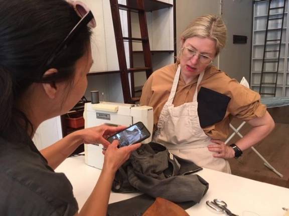 Tara Maurice (right) with Mending Lab visitor.