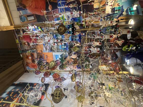 The Glass Haus, a vendor within the market itself, showcases an effervescent array of glass-blown ornaments.